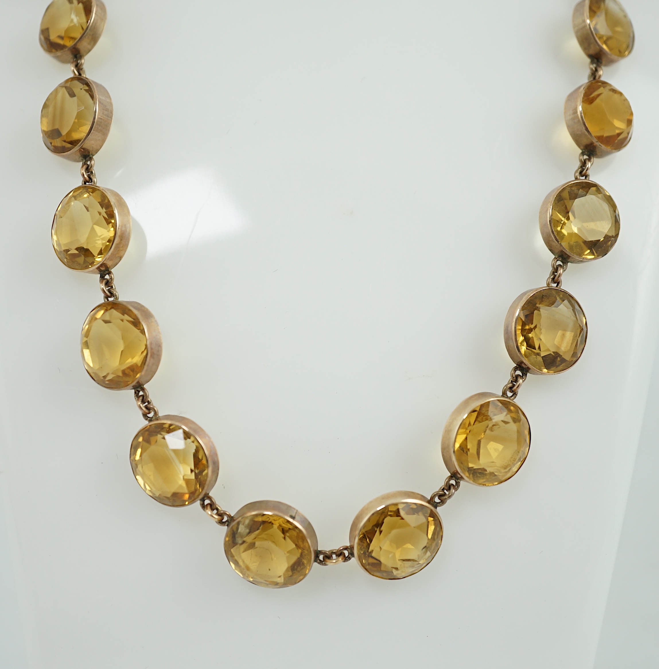 An early 19th century gold and citrine riviere necklace